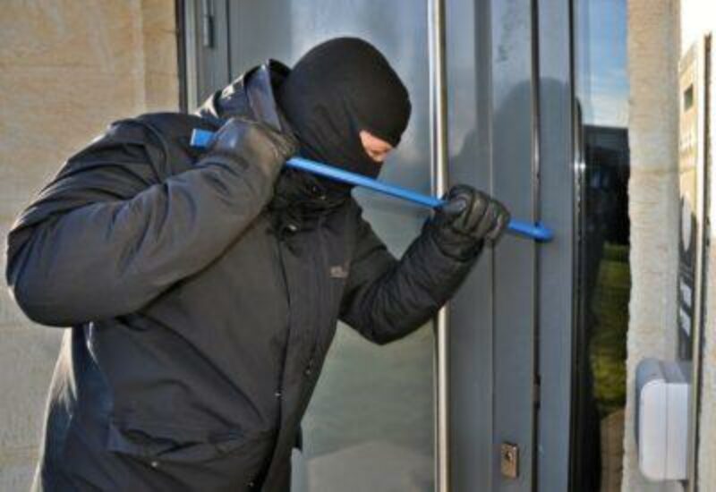 criminal breaking into house